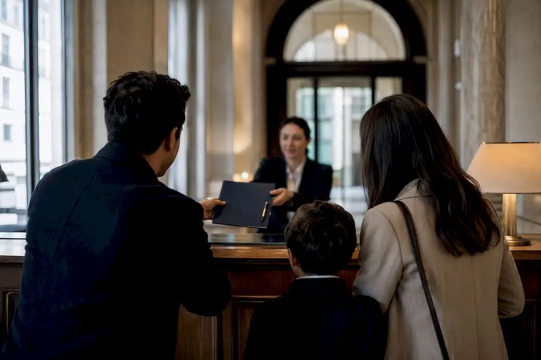 Family presenting reunification application at consulate